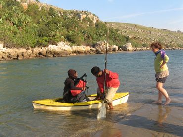 Local ferryman helps hikers cross the Mtentu River
