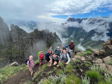 Reaching the top of the escarpment with like-minded friends - memories to treasure.