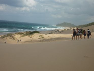 Light and shadow on the final beach stretch through to Kosi Mouth.