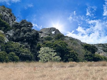 The rock formations of Sigurwana rise like ancient sentinels from the earth — sculpted by time into rugged outcrops, weathered cliffs, and craggy ridgelines that tell a silent story of geological time.