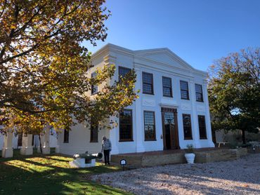 The grand entrance and tasting room of DeWetshof Estate